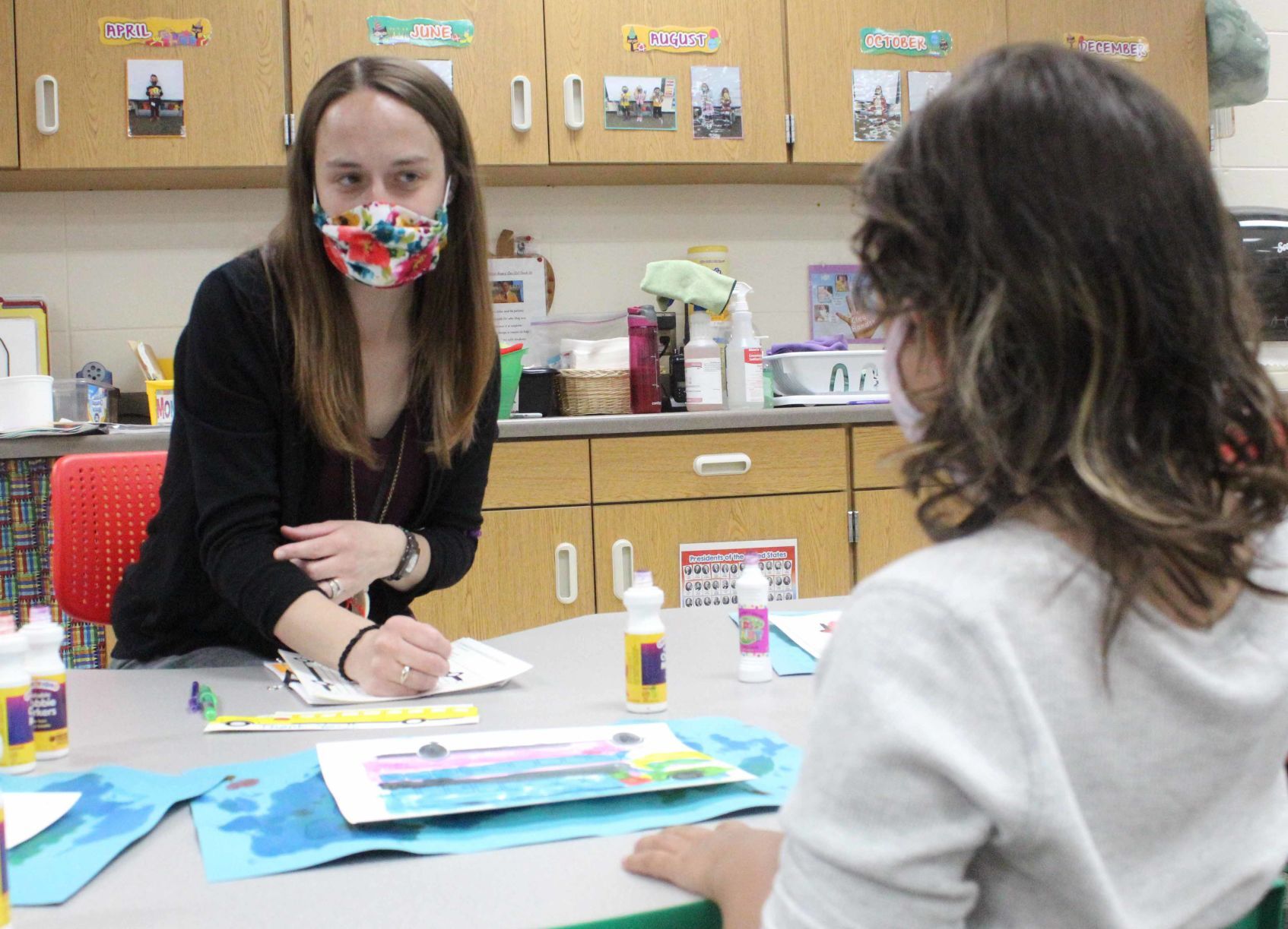 Katie helps student